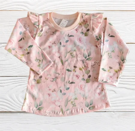 remera vuelitos melina rosa